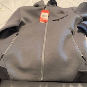 Brand new nice jacket to small for my husband